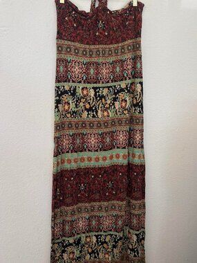 American Ragdoll maxi dress with halter neck and tie back. Multi-colored floral